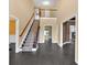 Open foyer with a staircase and wood floors at 900 Fox Croft Pl, Canton, GA 30114