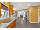 Open kitchen design with wood cabinets, granite countertops and stainless steel appliances at 900 Fox Croft Pl, Canton, GA 30114
