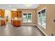 View of the eat-in kitchen area featuring wood cabinets and windows with backyard views at 900 Fox Croft Pl, Canton, GA 30114