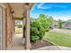 Covered porch with brick column base with view of street and front yard at 900 Fox Croft Pl, Canton, GA 30114