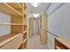 Walk-in closet with built-in shelving and ample storage space at 900 Fox Croft Pl, Canton, GA 30114