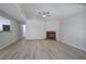 Open living room with modern floors, fireplace, and neutral color scheme at 2528 Mulberry Rock Rd, Dallas, GA 30157