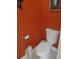 Bathroom featuring a standard toilet with a wall-mounted paper holder at 28 County Line #2 Rd, Rydal, GA 30171
