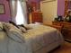 Bedroom with soft, diffused lighting and a large window at 28 County Line #2 Rd, Rydal, GA 30171
