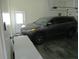 The garage of the property includes ample parking space and natural light at 28 County Line #2 Rd, Rydal, GA 30171