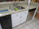 Gourmet kitchen featuring granite countertops, a stainless steel dishwasher and a sink with a great faucet at 28 County Line #2 Rd, Rydal, GA 30171