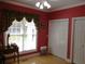 The living room features hardwood floors, a window, and a ceiling fan with lighting at 28 County Line #2 Rd, Rydal, GA 30171
