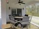 Covered patio featuring dining set, ceiling fans and easy access to backyard at 28 County Line #2 Rd, Rydal, GA 30171