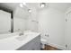 Modern bathroom featuring a blue vanity, a white countertop, and updated fixtures at 221 Semel Nw Cir # 245, Atlanta, GA 30309