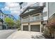 Stylish townhome featuring a private balcony, two-car garage, and charming curb appeal at 221 Semel Nw Cir # 245, Atlanta, GA 30309