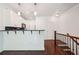 Modern kitchen with stainless steel appliances, a dark backsplash, and a curved countertop for seating at 221 Semel Nw Cir # 245, Atlanta, GA 30309