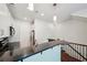 Beautiful kitchen with a curved granite countertop, stainless steel appliances, and pendant lighting at 221 Semel Nw Cir # 245, Atlanta, GA 30309