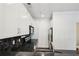 Bright kitchen with stainless steel appliances, white cabinets, and a dark backsplash at 221 Semel Nw Cir # 245, Atlanta, GA 30309