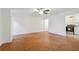 Open-concept living room with hardwood floors and access to the kitchen at 300 Peachtree Ne St # 5A, Atlanta, GA 30308