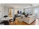 Bright living room with neutral decor, hardwood floors, and ample natural light at 300 Peachtree Ne St # 5A, Atlanta, GA 30308