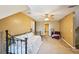 Neutral bedroom features ceiling fan, closet and tan walls at 330 Pitts Chapel Rd, Newborn, GA 30056