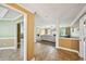 Inviting foyer with tile flooring and a view into the open-concept living room with a fireplace at 330 Pitts Chapel Rd, Newborn, GA 30056