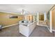 Spacious living room with neutral carpet, plenty of light, and open floor plan at 330 Pitts Chapel Rd, Newborn, GA 30056