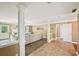 Bright open-concept living space showcasing modern flooring and neutral decor at 330 Pitts Chapel Rd, Newborn, GA 30056