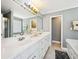 Bathroom features a large mirror over a double sink vanity and a shower and bathtub at 330 Pitts Chapel Rd, Newborn, GA 30056
