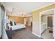 Spacious bedroom with access to ensuite bath and a view to the room's windows at 330 Pitts Chapel Rd, Newborn, GA 30056
