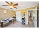 Bright home office featuring a ceiling fan, tile flooring, and a functional layout for productivity at 330 Pitts Chapel Rd, Newborn, GA 30056