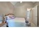Bedroom featuring a bed with a floral-patterned bedspread and neutral walls at 3945 Lorien Way, Kennesaw, GA 30152