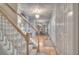 Hallway with chandelier is open to dining room with hard wood floors at 3945 Lorien Way, Kennesaw, GA 30152