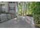 Side view of a home showing the driveway and landscaping with trees providing shade at 3945 Lorien Way, Kennesaw, GA 30152