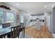 Bright and airy eat-in kitchen with a view of the deck and all-white cabinetry at 3945 Lorien Way, Kennesaw, GA 30152