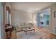 Cozy living room featuring a plush sofa and marble-topped coffee table at 3945 Lorien Way, Kennesaw, GA 30152
