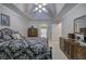 Spacious main bedroom with tray ceiling, carpeted floors, and access to the main bathroom at 3945 Lorien Way, Kennesaw, GA 30152