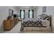 Main bedroom with carpeted floor, tray ceiling, dresser, and large window at 3945 Lorien Way, Kennesaw, GA 30152