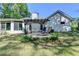 Backyard with a patio and pergola to enjoy outside seating at 4735 Rabbit Farm Rd, Loganville, GA 30052
