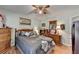 This lovely bedroom features hardwood floors, natural light, and a neutral color palette at 4735 Rabbit Farm Rd, Loganville, GA 30052