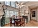 Charming breakfast nook featuring a ceiling fan and plenty of natural light from surrounding windows at 4735 Rabbit Farm Rd, Loganville, GA 30052