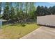 Backyard featuring partial fence and green space at 215 Morris Ln, Woodstock, GA 30188
