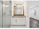 Updated bathroom with granite counters, new lighting, and glass shower at 215 Morris Ln, Woodstock, GA 30188