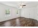 Bright bedroom with hardwood floors and lots of natural light at 215 Morris Ln, Woodstock, GA 30188