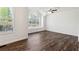 Bright bedroom with large windows and hardwood floors at 215 Morris Ln, Woodstock, GA 30188