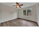 Well-lit bedroom with wood-look flooring and ample natural light at 4618 Barkley Nw Dr, Acworth, GA 30101