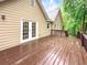 The home features a large wooden deck accessible through French doors, perfect for outdoor entertaining and relaxation at 4618 Barkley Nw Dr, Acworth, GA 30101