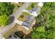 Bird's-eye view of a house situated in a tranquil, tree-lined neighborhood at 1450 Steam Engine Way, Conyers, GA 30013