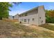 Expansive backyard with a small patio, perfect for outdoor activities and relaxation at 1450 Steam Engine Way, Conyers, GA 30013