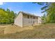 View of home from the backyard showing the lawn at 1450 Steam Engine Way, Conyers, GA 30013