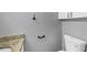 Cozy bathroom with vanity, granite countertop, and classic white toilet at 5854 Cobalt Dr, Powder Springs, GA 30127