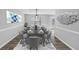 Formal dining room with modern decor featuring a large table with seating for ten and elegant wall art at 5854 Cobalt Dr, Powder Springs, GA 30127