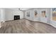 Spacious living area with a fireplace, hardwood flooring, and plenty of natural light at 5854 Cobalt Dr, Powder Springs, GA 30127