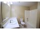 Bathroom featuring a tub shower, toilet, sink vanity, mirror, and neutral walls at 936 Bramble Oak Ct, Powder Springs, GA 30127