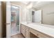 Bathroom with large vanity and a view into attached bath and bedroom at 936 Bramble Oak Ct, Powder Springs, GA 30127